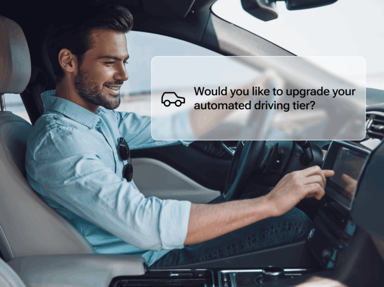 Driver interacting with a smart car interface to upgrade automated driving features—powered by car-to-cloud connectivity and OTA updates. Qualcomm